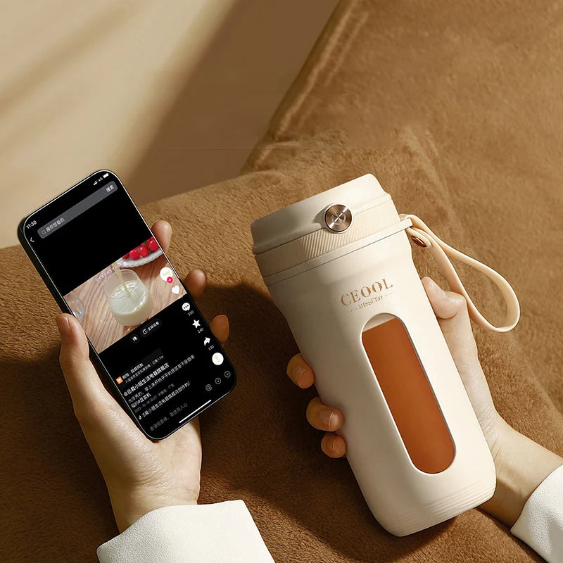 Electric portable blender making smoothie